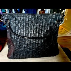 Special Edition shoulder bag, barely used, size12Hx15W. Embossed w/ LV design